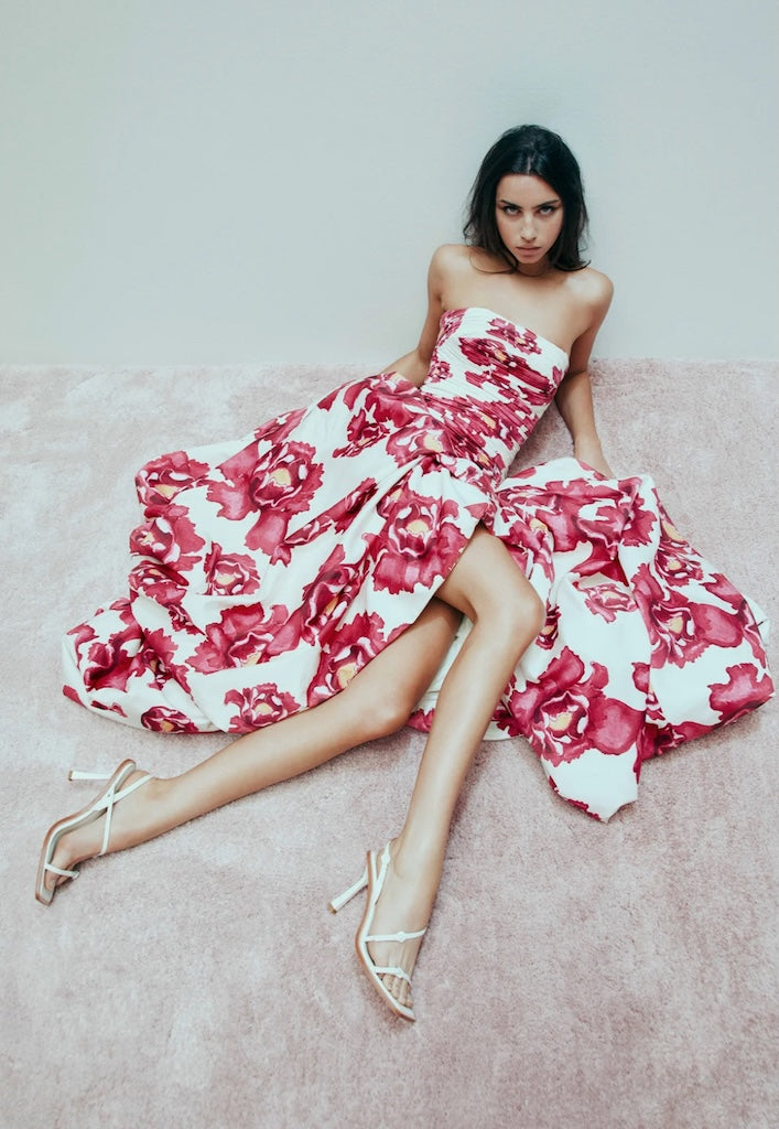 Aje Behold Blooming dress pink and white model laying on floor